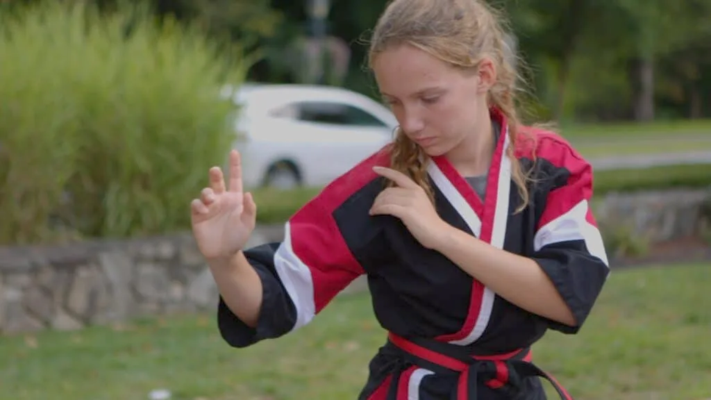 Student attending a martial arts for teens class